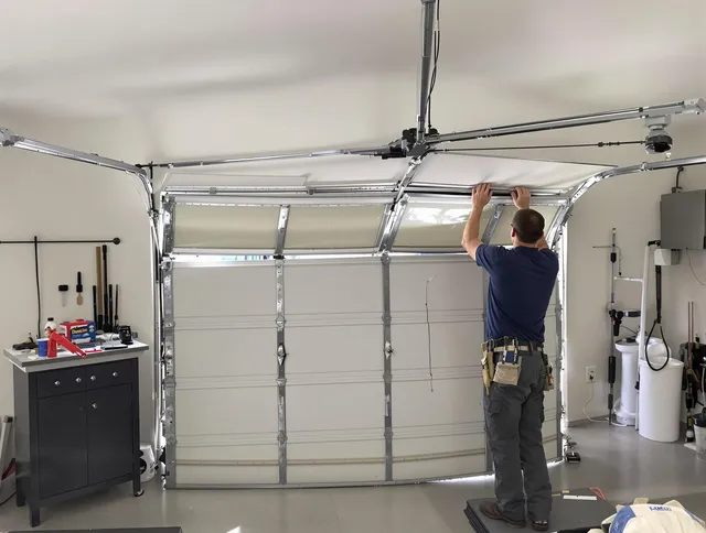 Hopkinton Garage Door Repair specialist performing precise section replacement on Hopkinton garage door