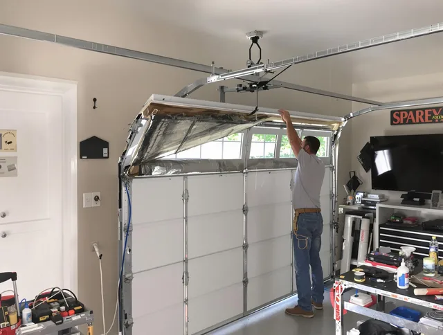 Garage door section replacement by Hopkinton Garage Door Repair in Hopkinton