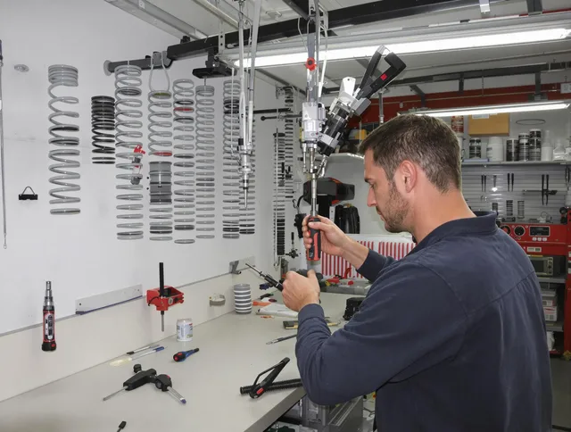 Hopkinton Garage Door Repair safety certified technician performing precision spring replacement in Hopkinton