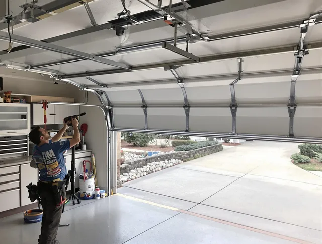 Garage door track repair service by Hopkinton Garage Door Repair in Hopkinton